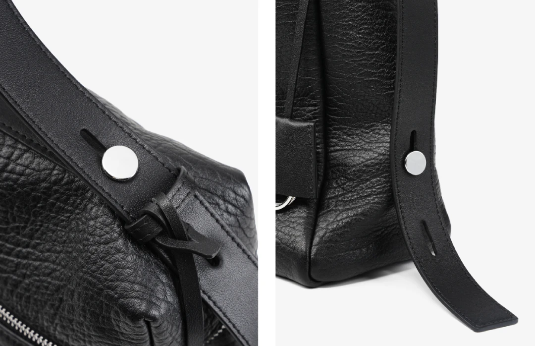An adjustable copper buckle allows for versatile styling, enabling you to wear the bag under the arm, on the shoulder, or as a crossbody. The strap is crafted from double-sided top-grain cowhide, which gives it a luxurious feel while being significantly softer and more comfortable on the shoulder than a microfiber strap.